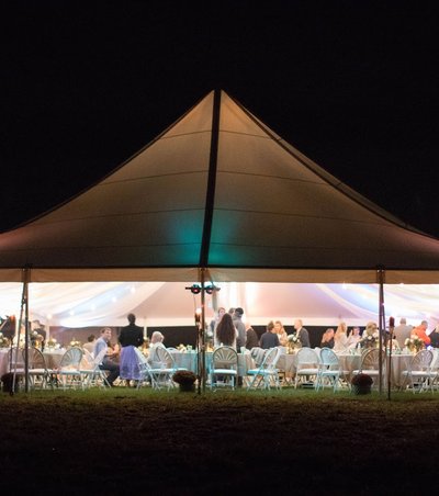 Stony Spring Manor with tent after dark
